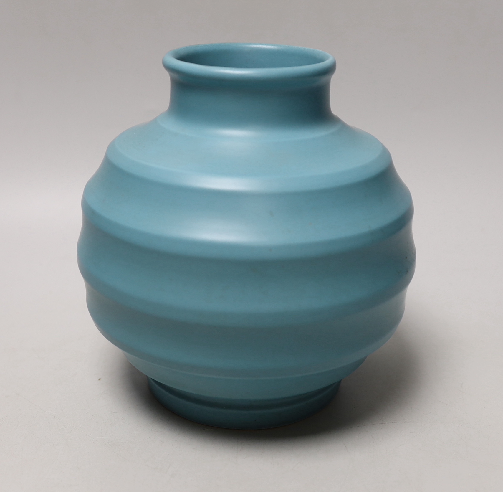 Keith Murray for Wedgwood - a blue glazed ribbed globular vase, 19cm high